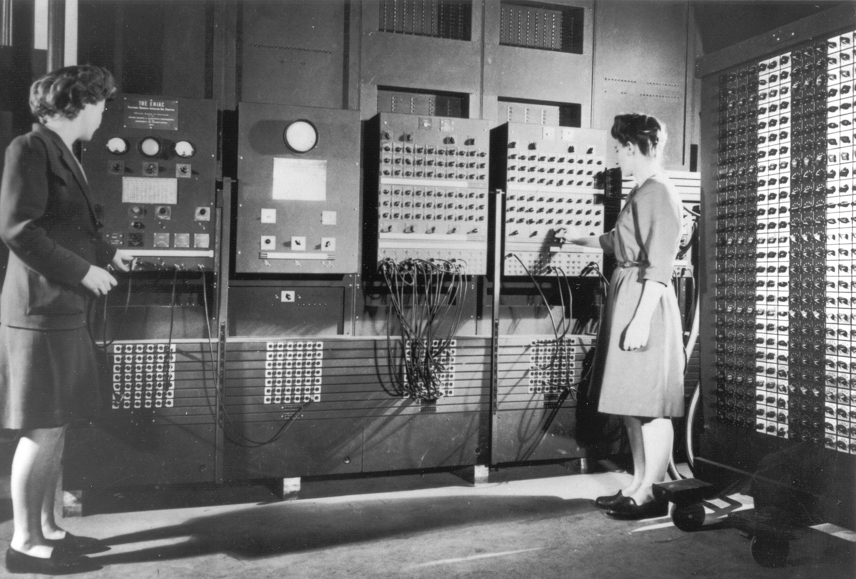 Two programmers operating ENIAC.